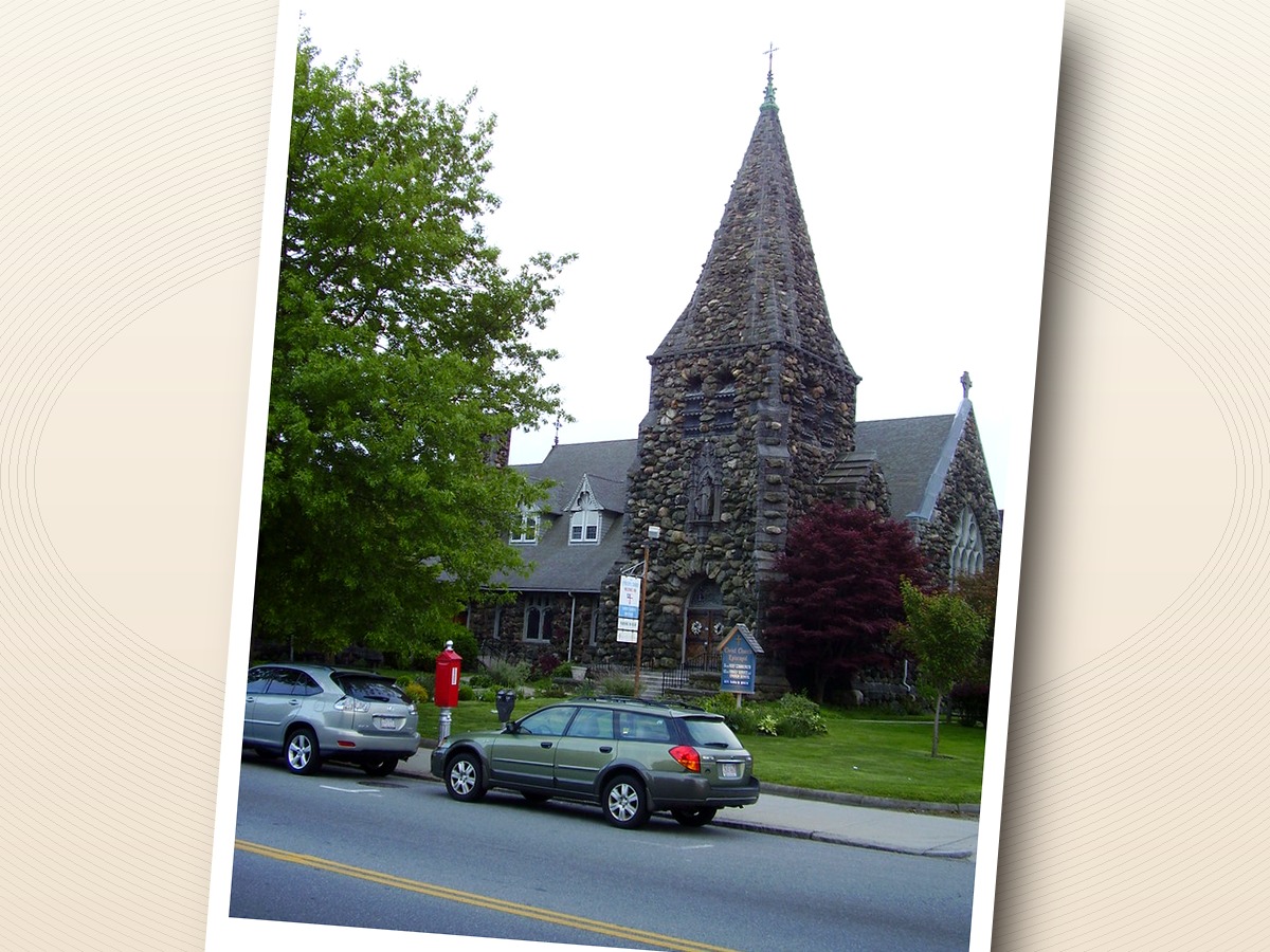 A beautiful photograph of a historic stone church, printed and floating in the air