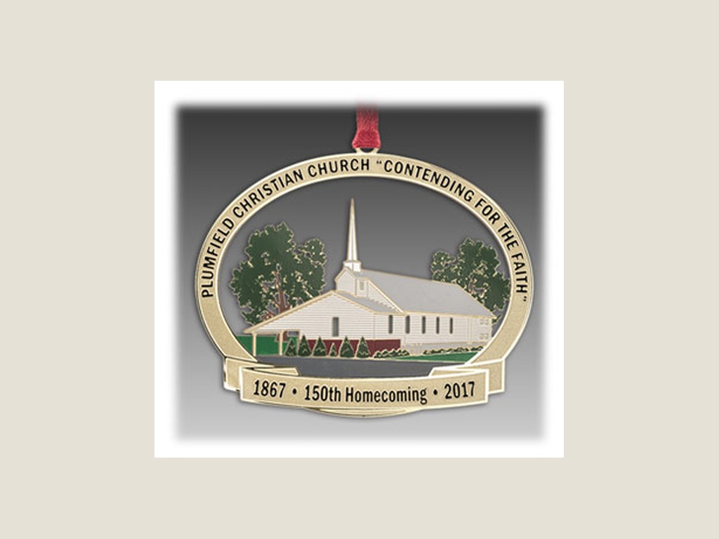 White church with its custom glass ornament held in front
